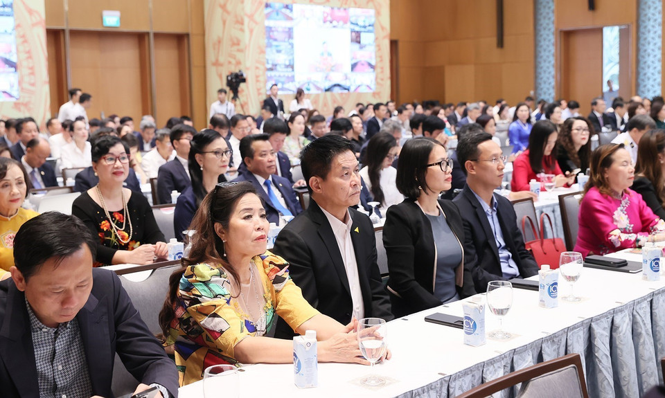 Các doanh nhân tham dự buổi gặp. (Ảnh: Dương Giang/TTXVN)