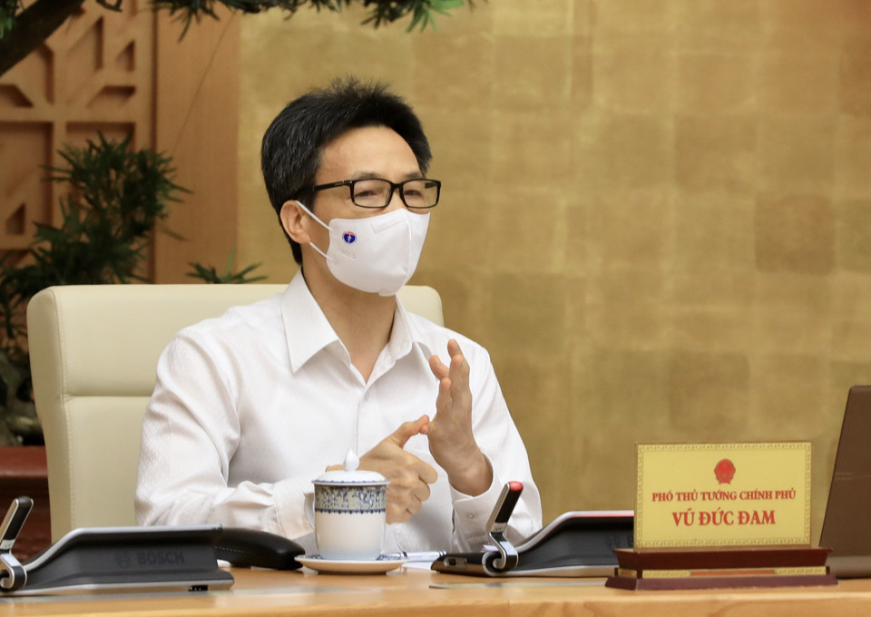 Phó Thủ tướng Vũ Đức Đam, Trưởng Ban Chỉ đạo Quốc gia phòng, chống dịch COVID-19 phát biểu tại cuộc họp trước diễn biến mới của dịch COVID-19. (Nguồn: TTXVN)