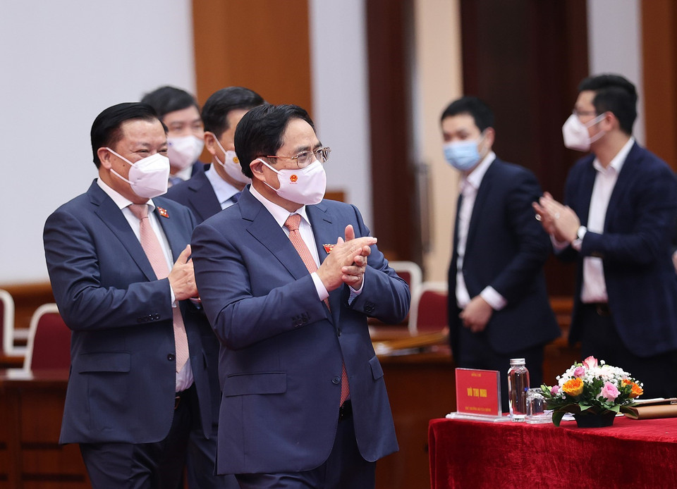 Thủ tướng Phạm Minh Chính đến dự hội nghị trực tuyến tổng kết công tác tài chính-ngân sách nhà nước năm 2021 và triển khai nhiệm vụ năm 2022. (Ảnh: Dương Giang/TTXVN)