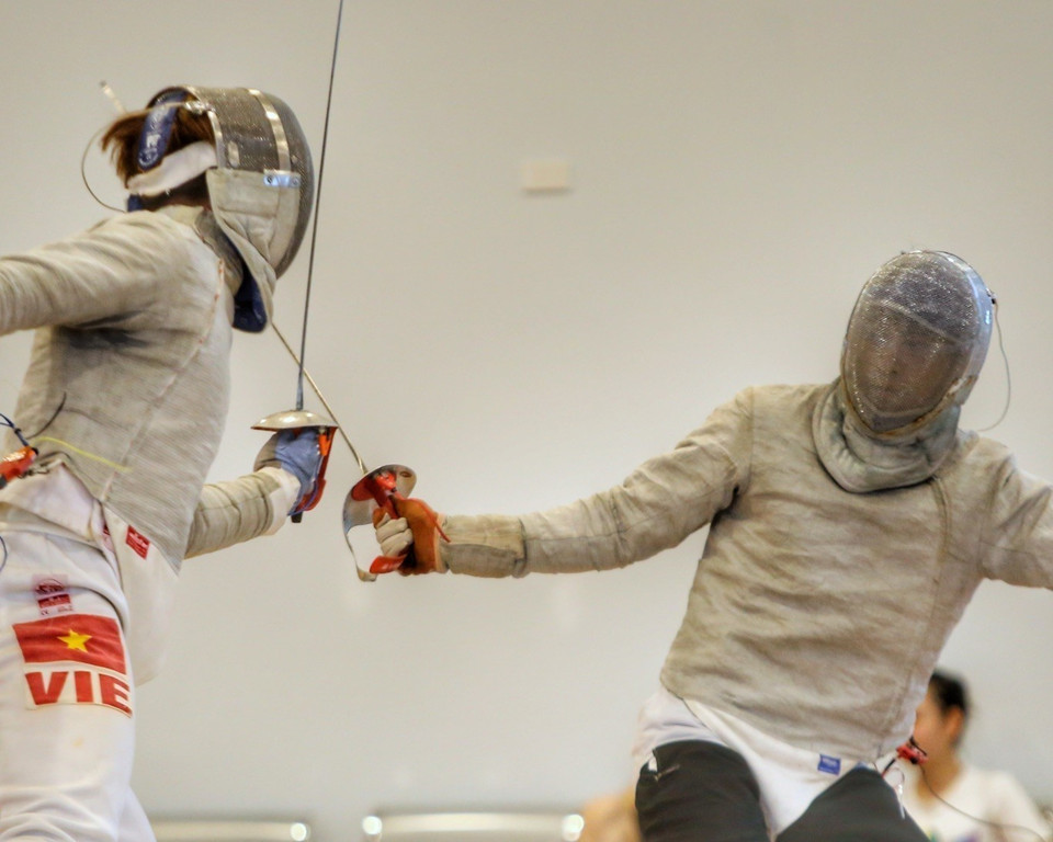 Hiện tại, toàn bộ ban huấn luyện và vận động viên đang tích cực tập luyện nhằm duy trì thể lực, kỹ thuật, chiến thuật và tâm lý tốt nhất, hướng tới mục tiêu mang về ít nhất 3 huy chương Vàng tại SEA Games 31. (Ảnh: Tuấn Đức/TTXVN)