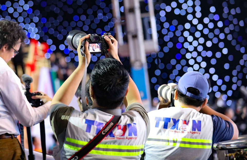 Nhóm phóng viên ảnh của Thông tấn xã Việt Nam tác nghiệp tại Đại hội Thể thao Đông Nam Á lần thứ 31 (SEA Games 31). (Nguồn: TTXVN)
