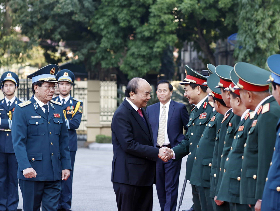 Chủ tịch nước Nguyễn Xuân Phúc dự Gặp mặt kỷ niệm 50 năm 'Chiến thắng Hà Nội-Điện Biên Phủ trên không.' (Ảnh: Thống Nhất/TTXVN)