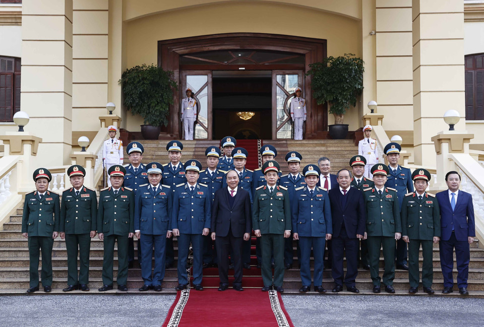 Chủ tịch nước Nguyễn Xuân Phúc với các đại biểu. (Ảnh: Thống Nhất/TTXVN)