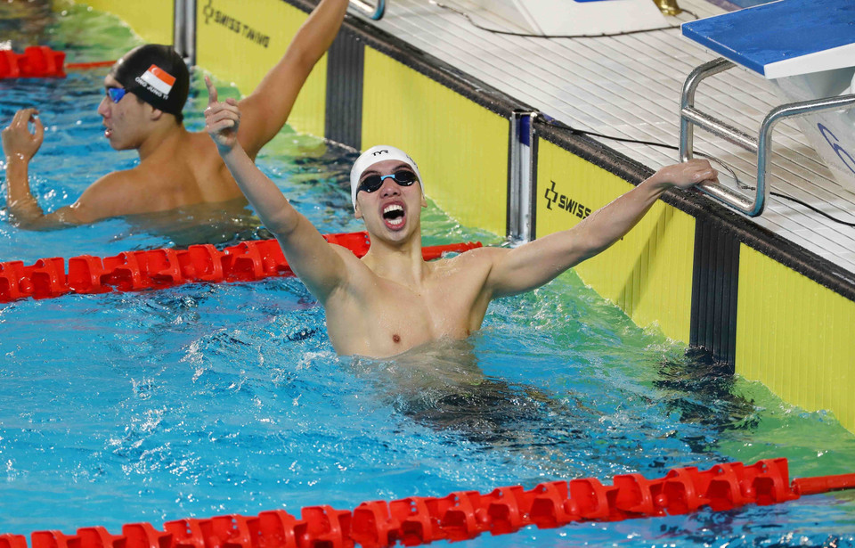 Vận động viên Nguyễn Huy Hoàng giành Huy chương Vàng nội dung 200m bơi bướm nam với thành tích 1 phút 58 giây 81. (Ảnh: TTXVN)