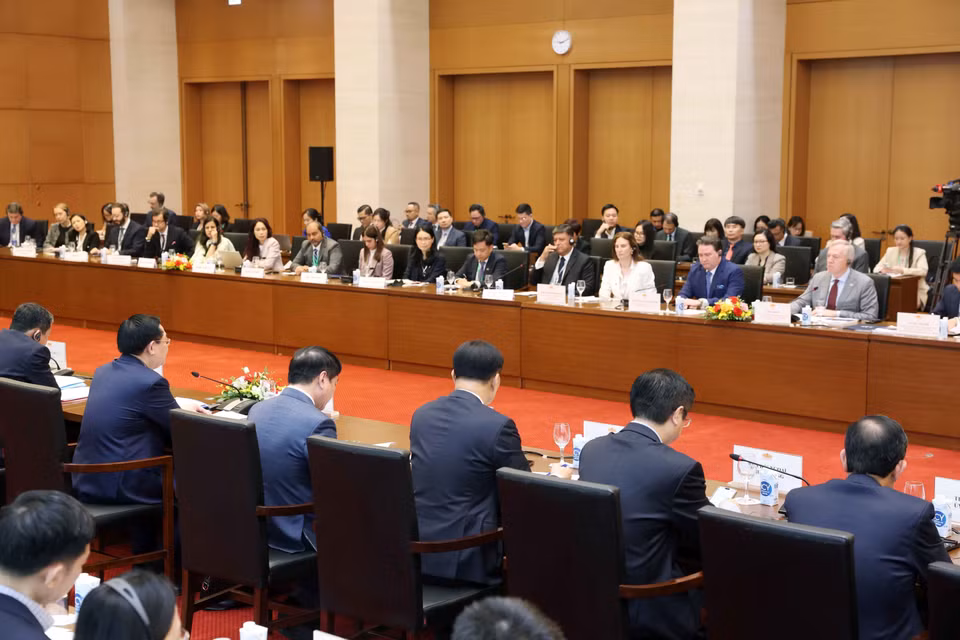 Các đại biểu dự buổi tiếp. (Ảnh: Nhan Sáng/TTXVN)