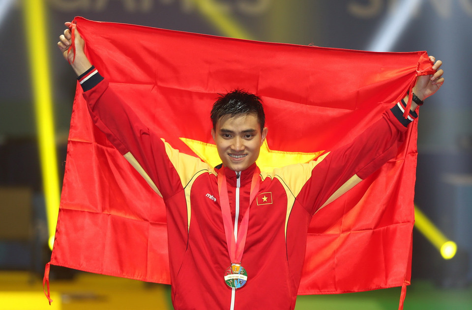 Vũ Thành An đoạt huy chương vàng thứ hai ở môn Đấu kiếm cho đoàn thể thao Việt Nam tại SEA Games 28. (Nguồn: Quốc Khánh/TTXVN)