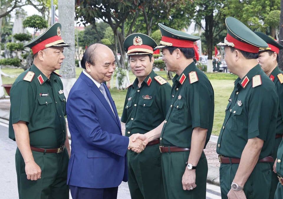 Chủ tịch nước Nguyễn Xuân Phúc với các đại biểu tham dự hội thảo. (Ảnh: Thống Nhất/TTXVN)