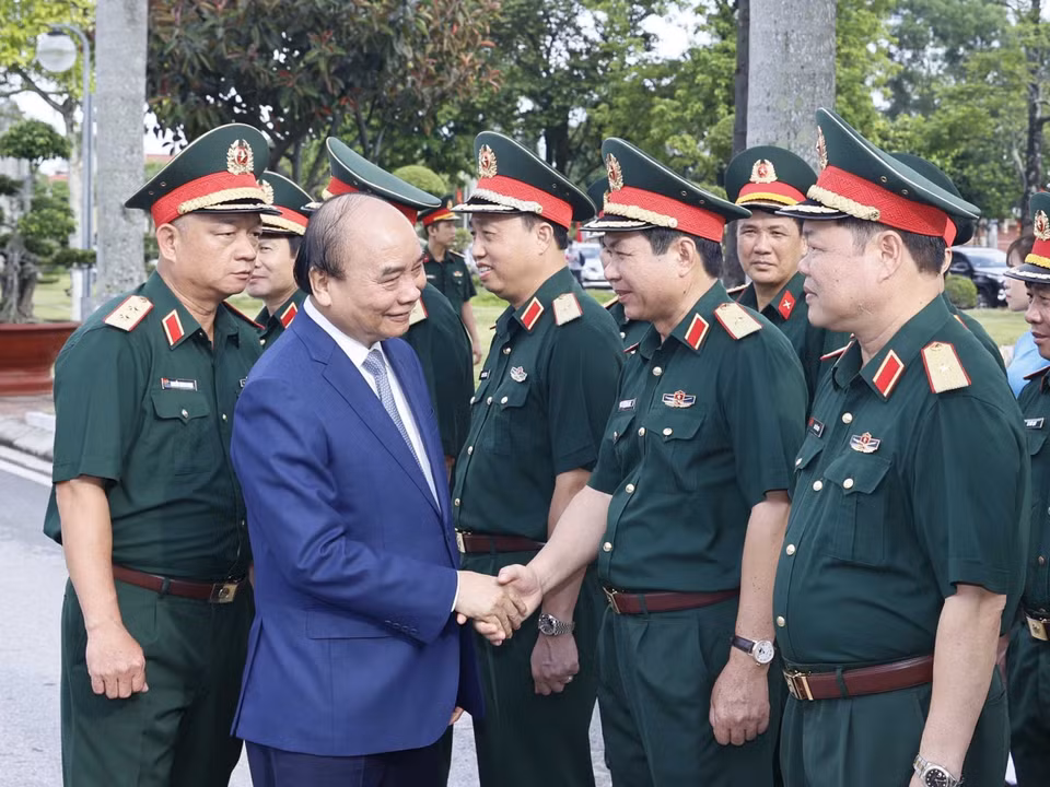 Chủ tịch nước Nguyễn Xuân Phúc với các đại biểu tham dự hội thảo. (Ảnh: Thống Nhất/TTXVN)