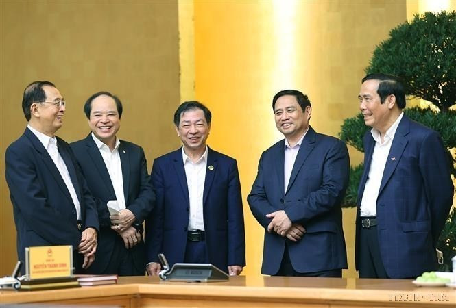 Thủ tướng Phạm Minh Chính với các đại biểu Trung ương Hội Người cao tuổi Việt Nam (22/3/2022). (Ảnh: Dương Giang/TTXVN)