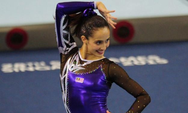 Farah Ann Abdul Hadi lại phải hứng chịu sự chỉ trích của những người theo đạo Hồi tại quê hương vì đã dạng chân quá rộng khi thực hiện bài thi giành huy chương vàng tại SEA Games 28. (Nguồn: AP)