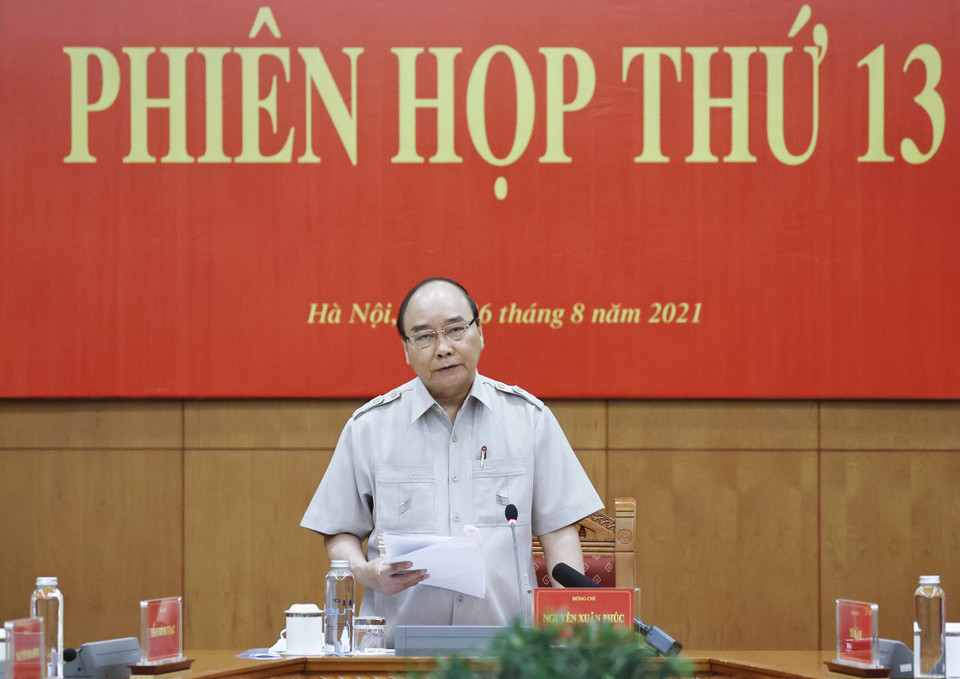 Hình ảnh Chủ tịch nước Nguyễn Xuân Phúc, Trưởng Ban Chỉ đạo cải cách Tư pháp Trung ương phát biểu chỉ đạo tại phiên họp. (Ảnh: Thống Nhất/TTXVN)