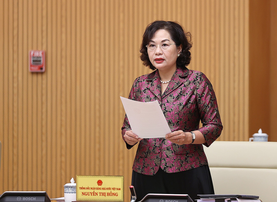 Thống đốc Ngân hàng Nhà nước Việt Nam Nguyễn Thị Hồng báo cáo về điều hành chính sách tiền tệ. (Ảnh: Dương Giang/TTXVN)