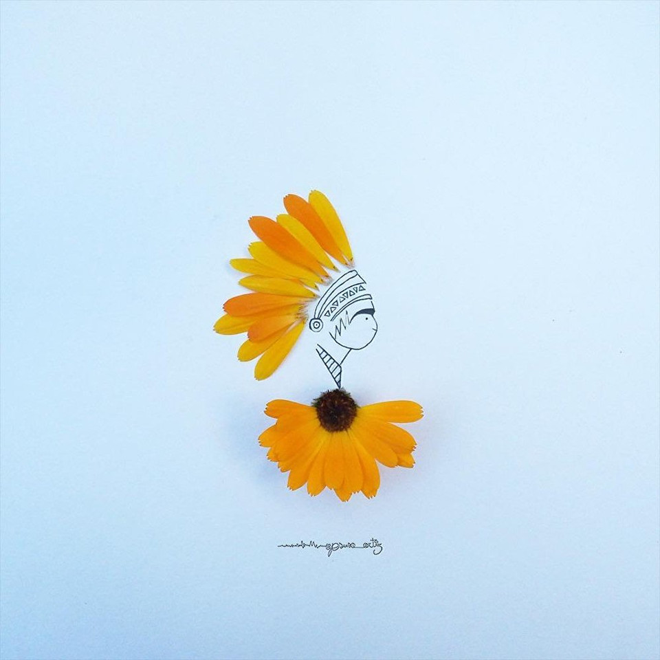 Những cánh hoa cúc làm nên vẻ đẹp cho trang phục thổ dân. (Nguồn: Sputnik)