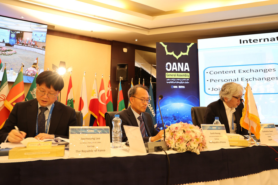 Các đại biểu dự phiên thảo luận tại Đại hội đồng OANA lần thứ 18. (Ảnh: TTXVN phát)