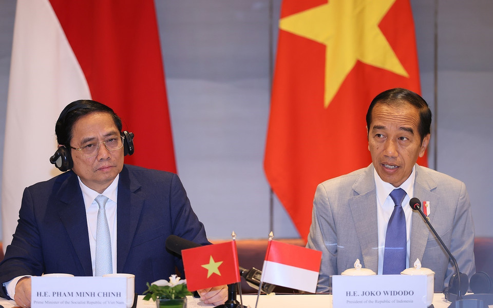 Thủ tướng Phạm Minh Chính và Tổng thống Joko Widodo tại Đối thoại Doanh nghiệp Cấp cao Việt Nam-Indonesia. (Ảnh: Dương Giang/TTXVN)