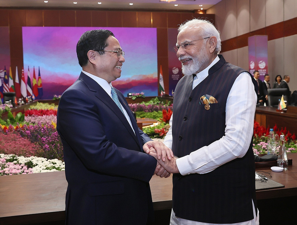 Thủ tướng Phạm Minh Chính trao đổi với Thủ tướng Ấn Độ Narendra Modi tại Hội nghị Cấp cao ASEAN-Ấn Độ lần thứ 20. (Ảnh: Dương Giang/TTXVN)