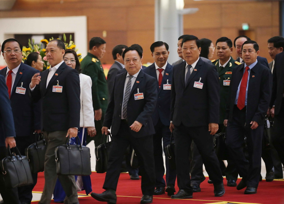  Các đại biểu đến dự ngày làm việc chính thức thứ hai Đại hội XIII của Đảng. (Ảnh: TTXVN)