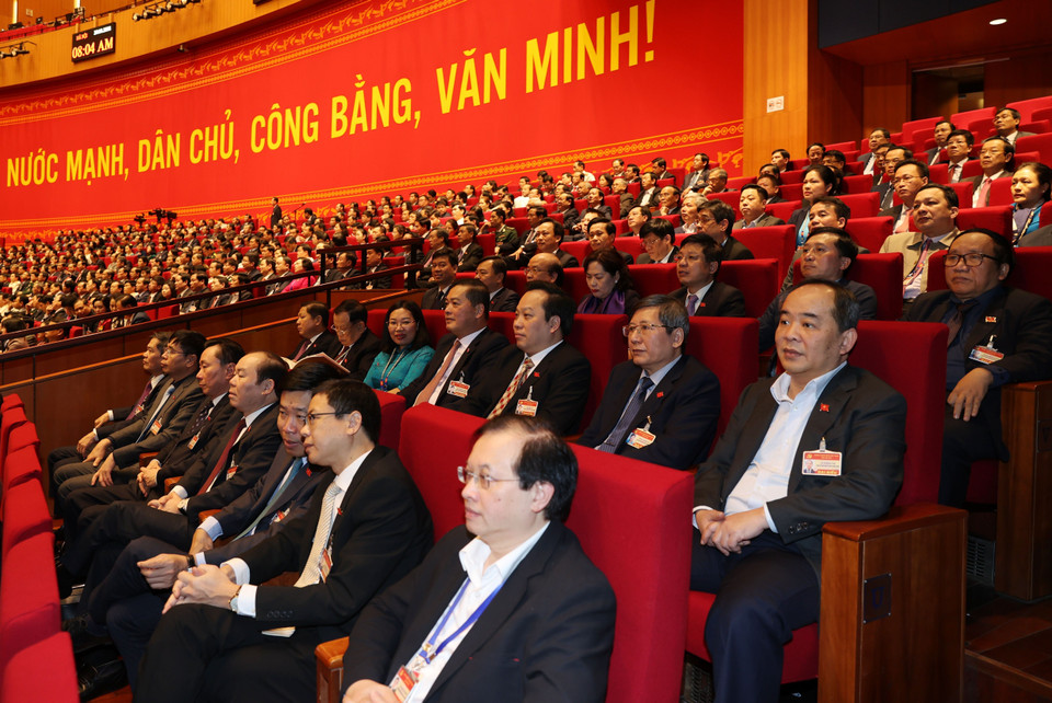 Các đại biểu đến dự ngày làm việc chính thức thứ hai Đại hội XIII của Đảng. (Ảnh: TTXVN)