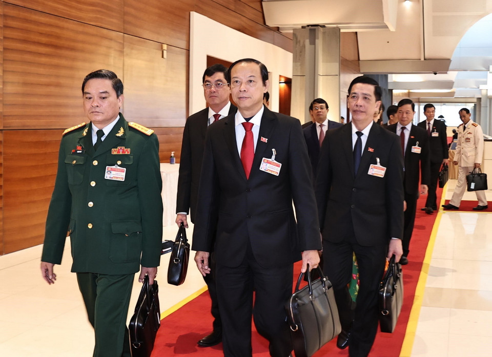  Các đại biểu đến dự ngày làm việc chính thức thứ hai Đại hội XIII của Đảng. (Ảnh: TTXVN)