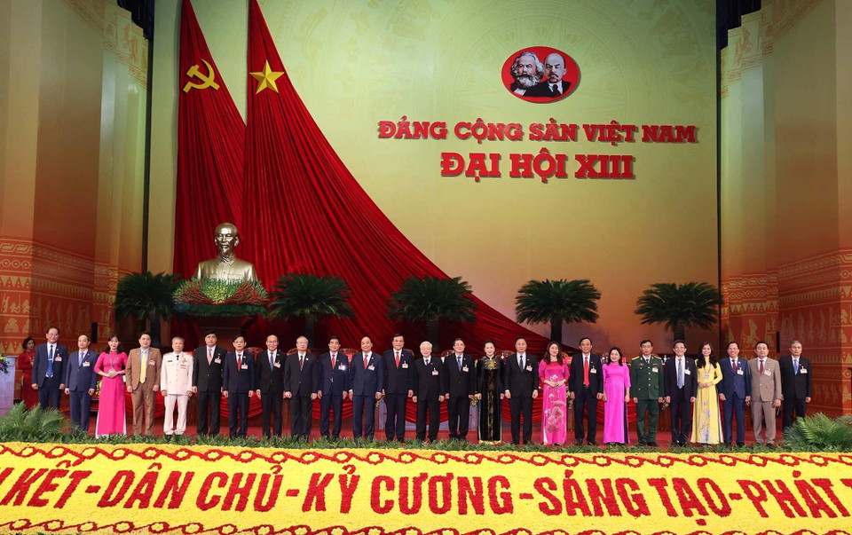 Lãnh đạo Đảng, Nhà nước chụp ảnh chung với Đoàn đại biểu Đảng bộ tỉnh Quảng Nam. (Ảnh: TTXVN)