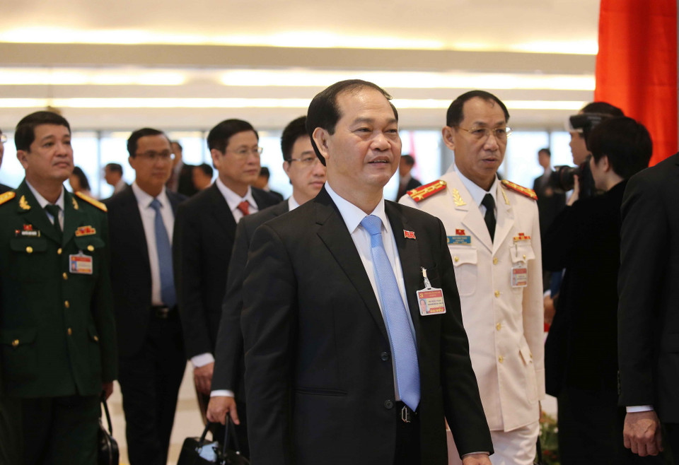  Các đại biểu đến dự ngày làm việc chính thức thứ hai Đại hội XIII của Đảng. (Ảnh: TTXVN)