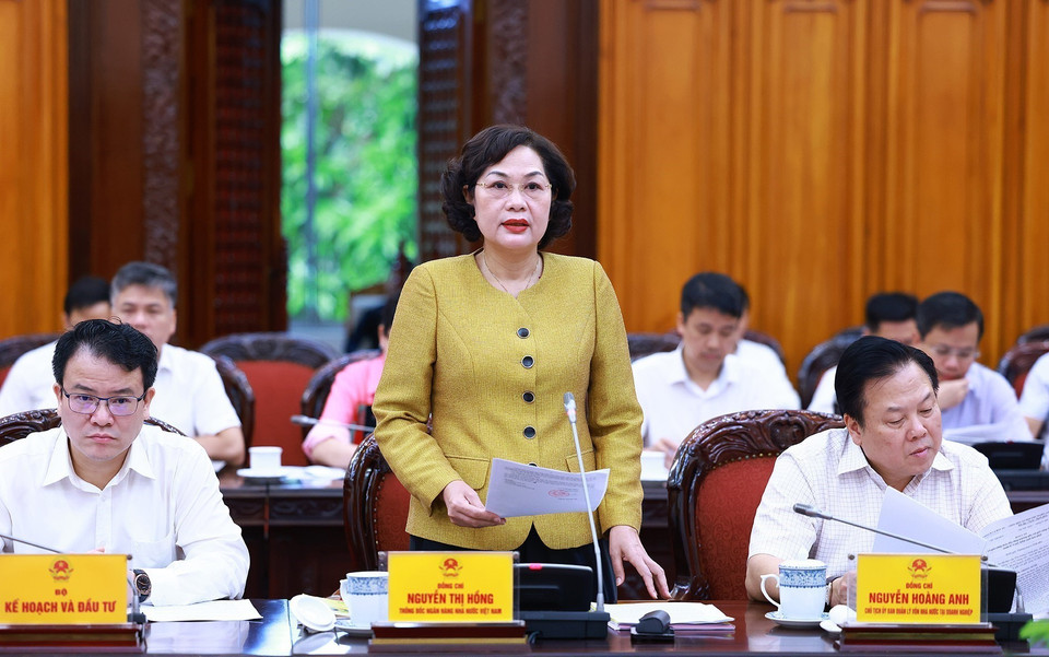 Thống đốc Ngân hàng Nhà nước Việt Nam Nguyễn Thị Hồng báo cáo điều hành thị trường tiền tệ và chính sách tài khóa. (Ảnh: Dương Giang/TTXVN)