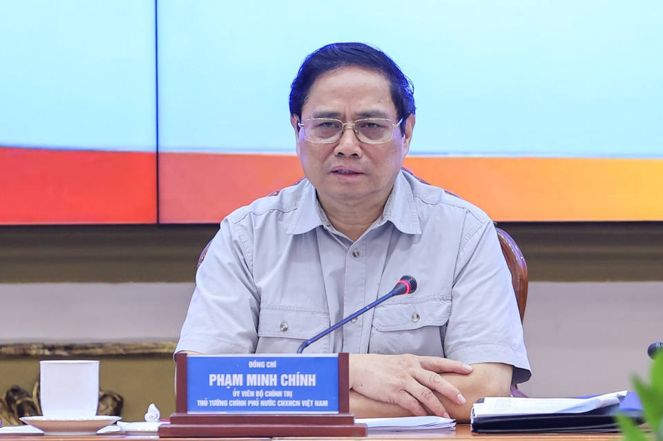 Thủ tướng Phạm Minh Chính chủ trì làm việc giữa Thường trực Chính phủ với Ban Thường vụ Thành ủy Thành phố Hồ Chí Minh. (Ảnh: Dương Giang/TTXVN)