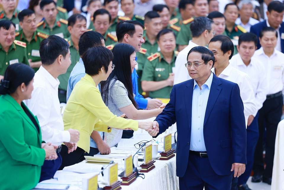 Thủ tướng Phạm Minh Chính với các đại biểu dự Hội nghị đảm bảo an ninh trật tự phục vụ phát triển kinh tế-xã hội các tỉnh Tây Nguyên. (Ảnh: Dương Giang/TTXVN)