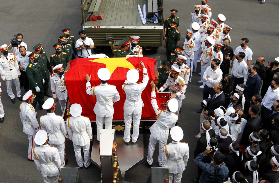 Nghi lễ di quan tiễn biệt đồng chí Trương Vĩnh Trọng về nơi an nghỉ cuối cùng. (Ảnh: Thanh Vũ/TTXVN)