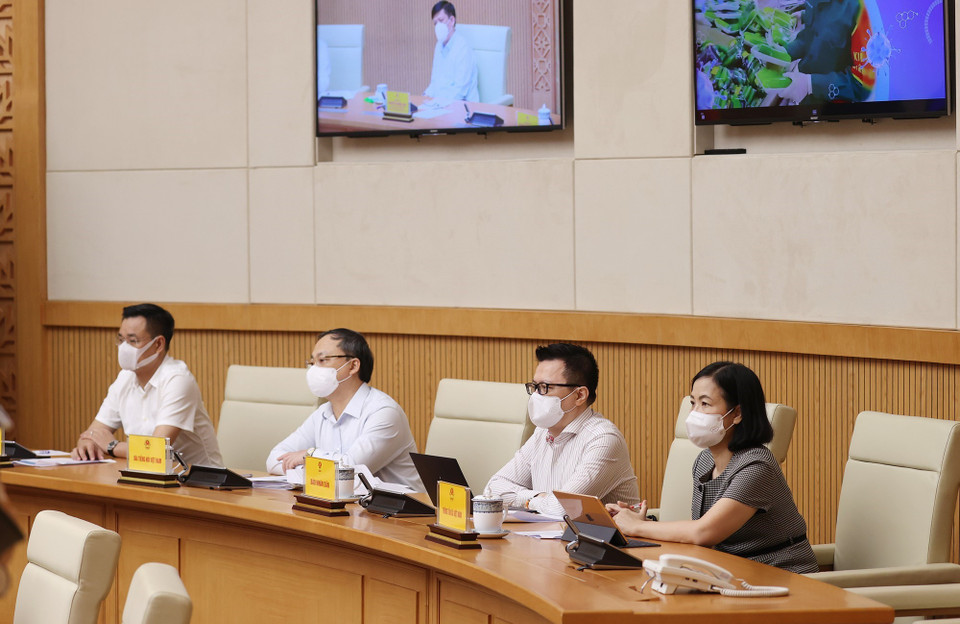 Đại diện lãnh đạo các cơ quan báo chí tham dự tại điểm cầu Chính phủ. (Ảnh: Dương Giang/TTXVN)