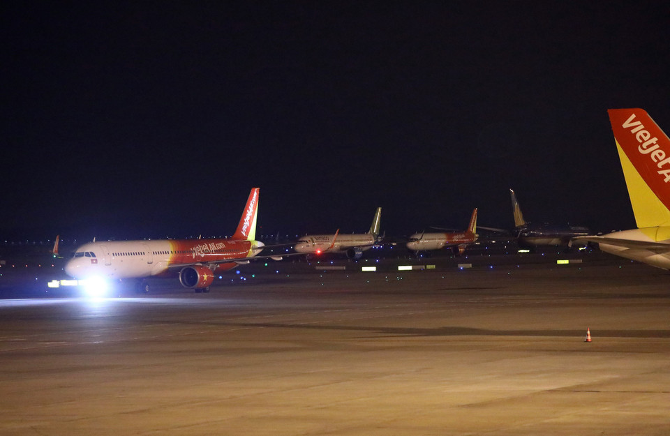 Chuyến bay từ Nhật về Việt Nam của hãng hàng không Vietjet trong những ngày đầu năm 2022. (Ảnh: Huy Hùng/TTXVN)