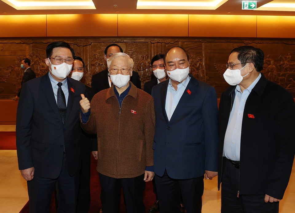 Tổng Bí thư Nguyễn Phú Trọng, Chủ tịch nước Nguyễn Xuân Phúc,Thủ tướng Chính phủ Phạm Minh Chính, Chủ tịch Quốc hội Vương Đình Huệ dự Kỳ họp thứ hai, Quốc hội khóa XV. (Ảnh: Trí Dũng/TTXVN)