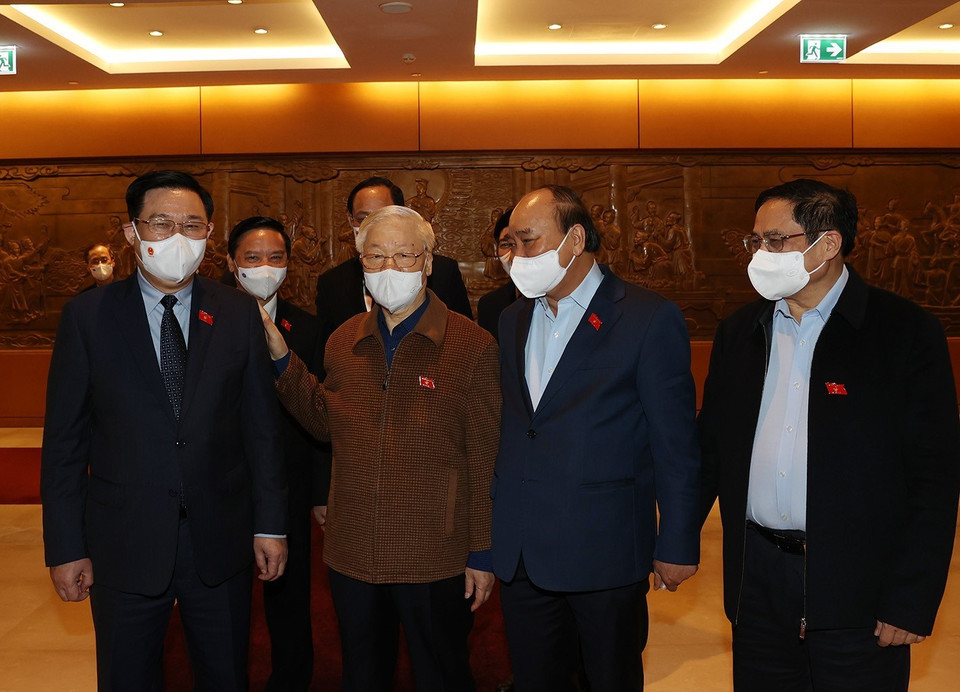 Tổng Bí thư Nguyễn Phú Trọng, Chủ tịch nước Nguyễn Xuân Phúc,Thủ tướng Chính phủ Phạm Minh Chính, Chủ tịch Quốc hội Vương Đình Huệ dự Kỳ họp thứ hai, Quốc hội khóa XV. (Ảnh: Trí Dũng/TTXVN)