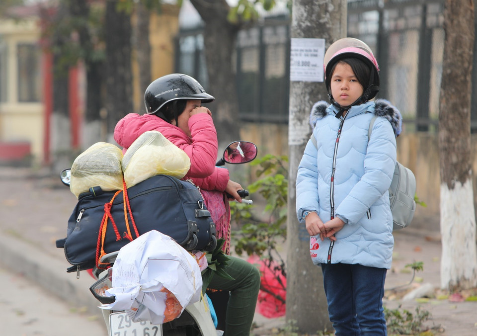 Hàng ngàn người dân sinh sống và làm việc tại Hà Nội bắt đầu rời thành phố về quê nghỉ Tết Canh Tý 2020. (Ảnh: Thành Đạt/TTXVN)