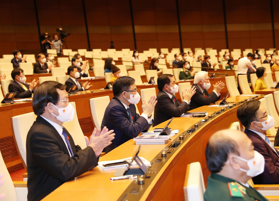 Các đại biểu Quốc hội dự phiên khai mạc. (Ảnh: Trọng Đức/TTXVN)