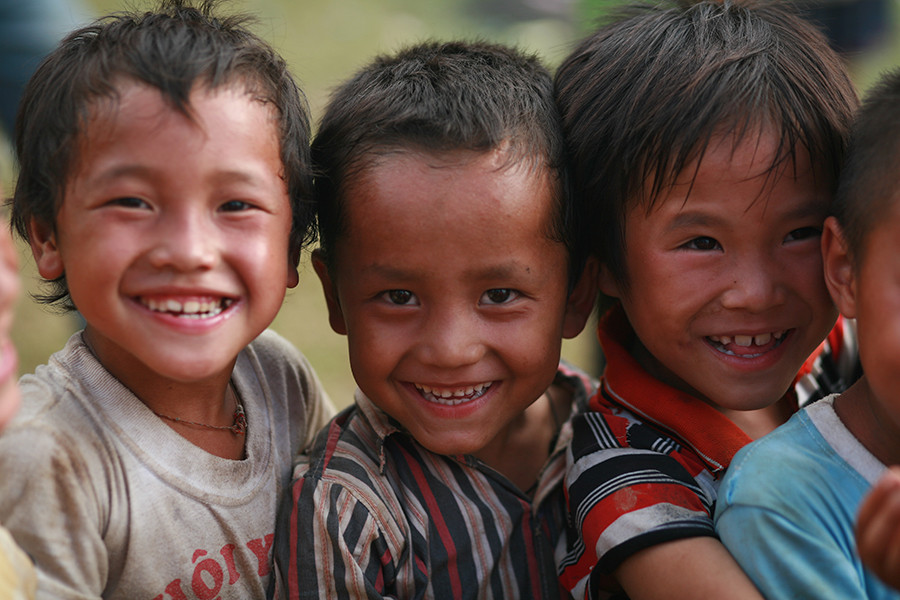 Những nụ cười rạng rỡ trên những gương mặt rám nắng. (Ảnh: Minh Sơn/Vietnam+)