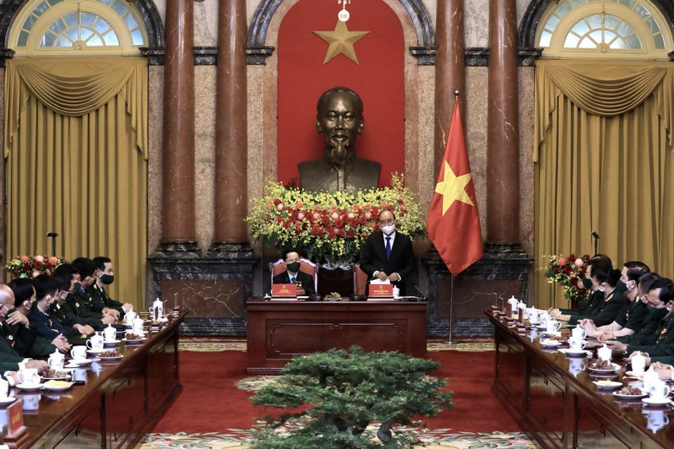 Chủ tịch nước Nguyễn Xuân Phúc phát biểu, ghi nhận những nỗ lực của các doanh nghiệp, doanh nhân cựu chiến binh trong sản xuất kinh doanh, đóng góp vào các hoạt động xã hội, đặc biệt là công tác phòng, chống COVID-19. (Ảnh: Lâm Khánh/TTXVN)