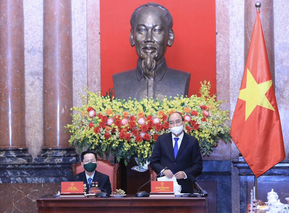 Chủ tịch nước Nguyễn Xuân Phúc phát biểu tại buổi gặp mặt đoàn đại biểu doanh nhân là cựu chiến binh. (Ảnh: Lâm Khánh/TTXVN)