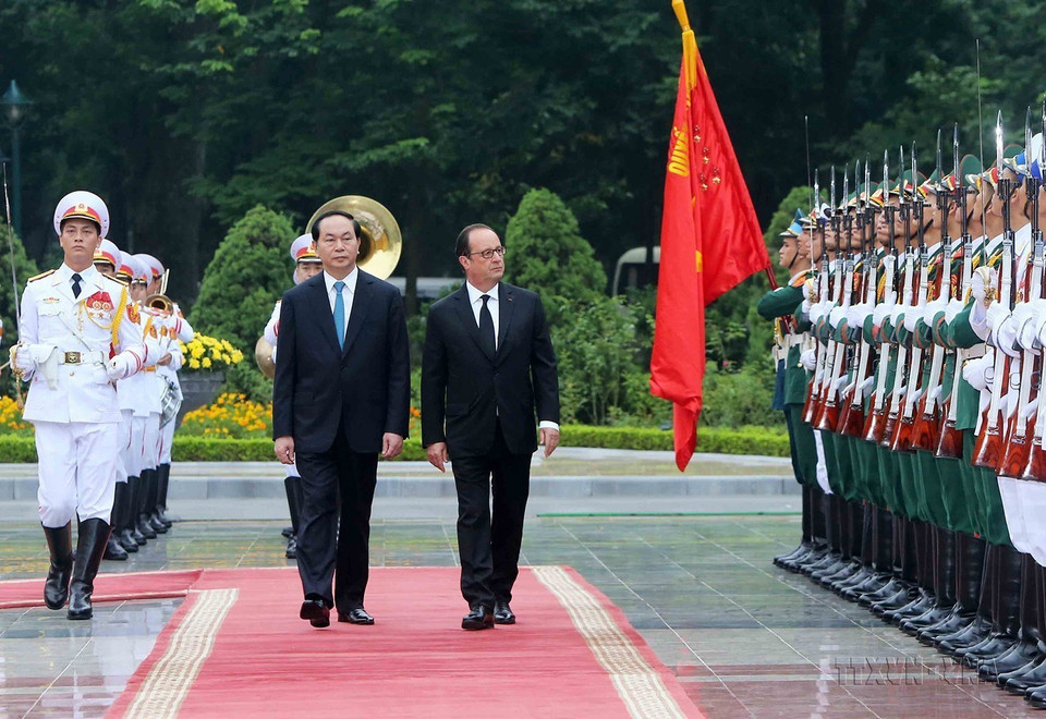 Chủ tịch nước Trần Đại Quang chủ trì lễ đón Tổng thống Pháp Francois Hollande thăm chính thức Việt Nam từ ngày 5-7/9/2016. (Ảnh: Nhan Sáng/TTXVN)