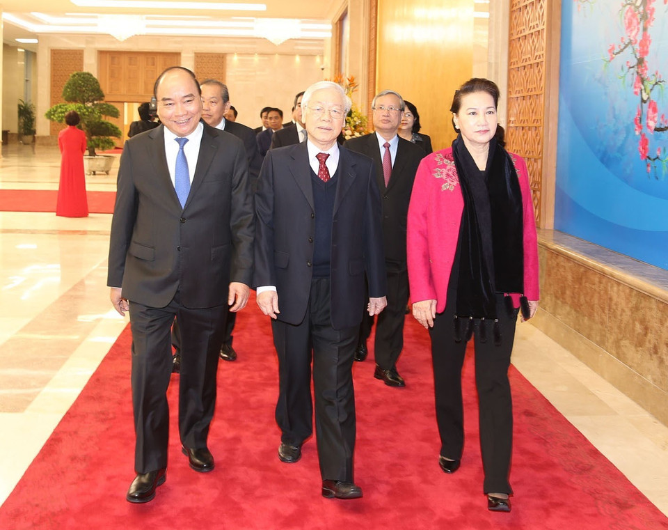 Tổng Bí thư, Chủ tịch nước Nguyễn Phú Trọng; Thủ tướng Chính phủ Nguyễn Xuân Phúc; Chủ tịch Quốc hội Nguyễn Thị Kim Ngân đến dự hội nghị. (Ảnh: Trí Dũng/TTXVN) 