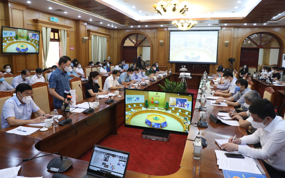 Quang cảnh cuộc họp tại đầu cầu Bắc Giang. (Ảnh: Danh Lam/TTXVN)