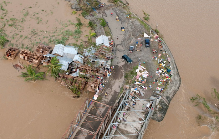 Cảnh tàn phá ở Iloilo, bờ biển miền trung Philippines ngày 9/11 sau bão Haiyan. (Ảnh: AFP/TTXVN