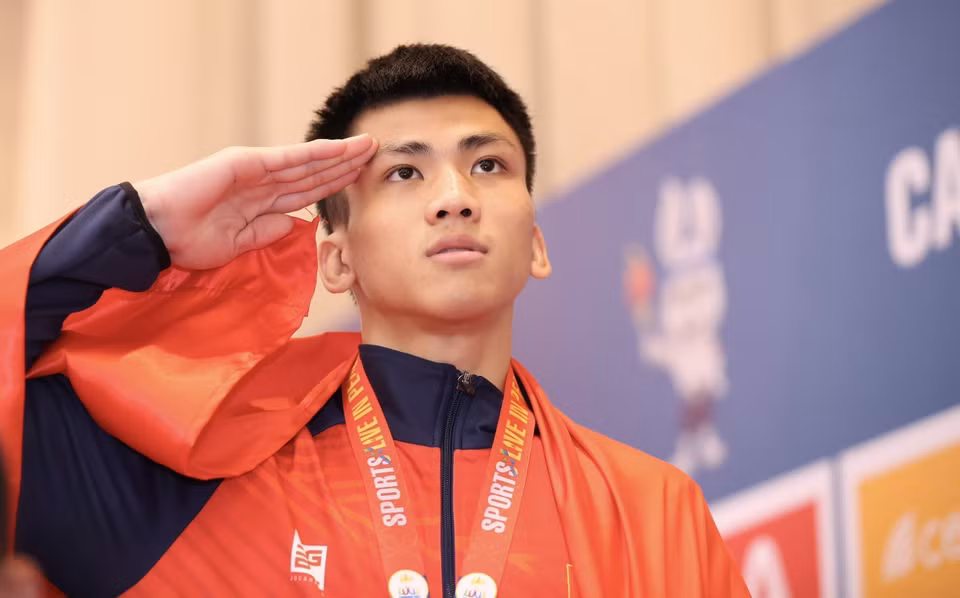 Vận động viên Trương Văn Chưởng giành huy chương Vàng hạng cân 65 kg nam nội dung Tán thủ. (Ảnh: Hoàng Linh/TTXVN)