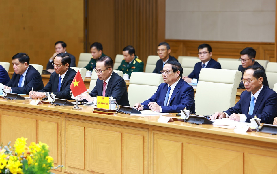 Thủ tướng Phạm Minh Chính hội kiến Tổng Bí thư, Chủ tịch nước Lào Thongloun Sisoulith. (Ảnh: Dương Giang/TTXVN)