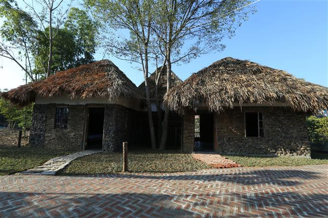 Nhà cộng đồng trong khu homestay Mường Then. (Ảnh: Tuấn Anh/TTXVN)
