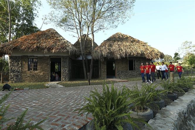 Nhà cộng đồng tại homestay Mường Then. (Ảnh: Tuấn Anh/TTXVN)