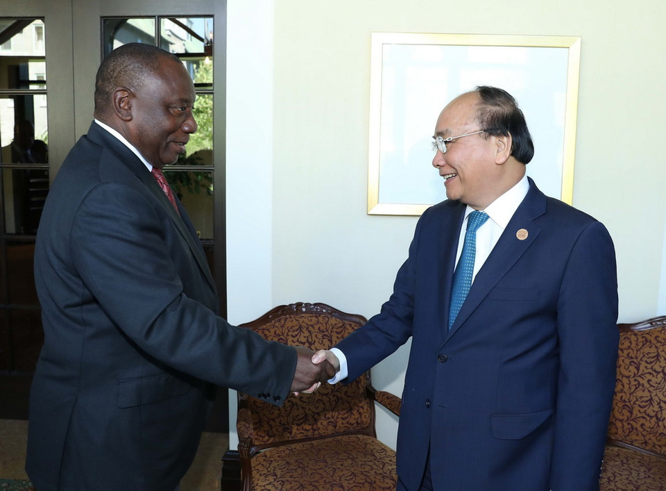 Thủ tướng Nguyễn Xuân Phúc gặp Tổng thống Nam Phi Cyril Ramaphosa. (Ảnh: Thống Nhất/TTXVN)