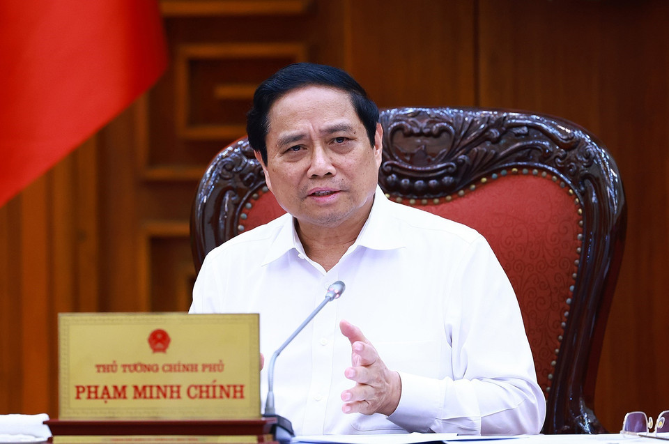 Thủ tướng Phạm Minh Chính chủ trì cuộc họp tháo gỡ khó khăn, thúc đẩy phát triển nhà ở xã hội. )Ảnh: Dương Giang/TTXVN)