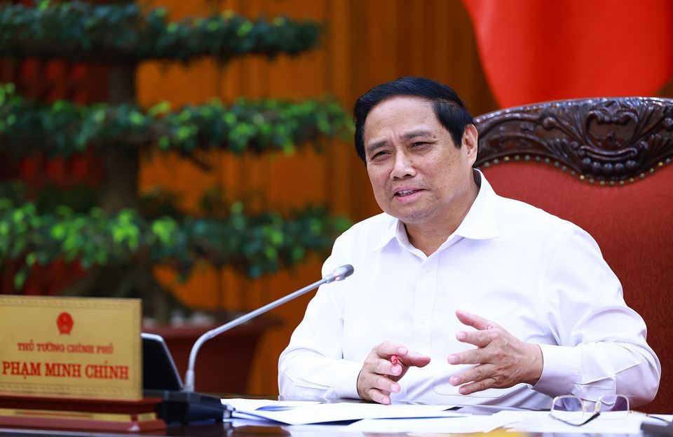Thủ tướng Phạm Minh Chính chủ trì cuộc họp tháo gỡ khó khăn, thúc đẩy phát triển nhà ở xã hội. )Ảnh: Dương Giang/TTXVN)