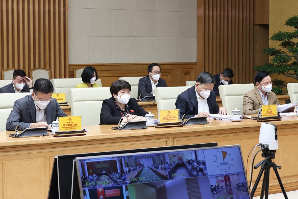 Các thành viên Ban Chỉ đạo Quốc gia phòng, chống dịch COVID-19 tham dự họp tại điểm cầu Chính phủ. (Ảnh: Dương Giang/TTXVN)